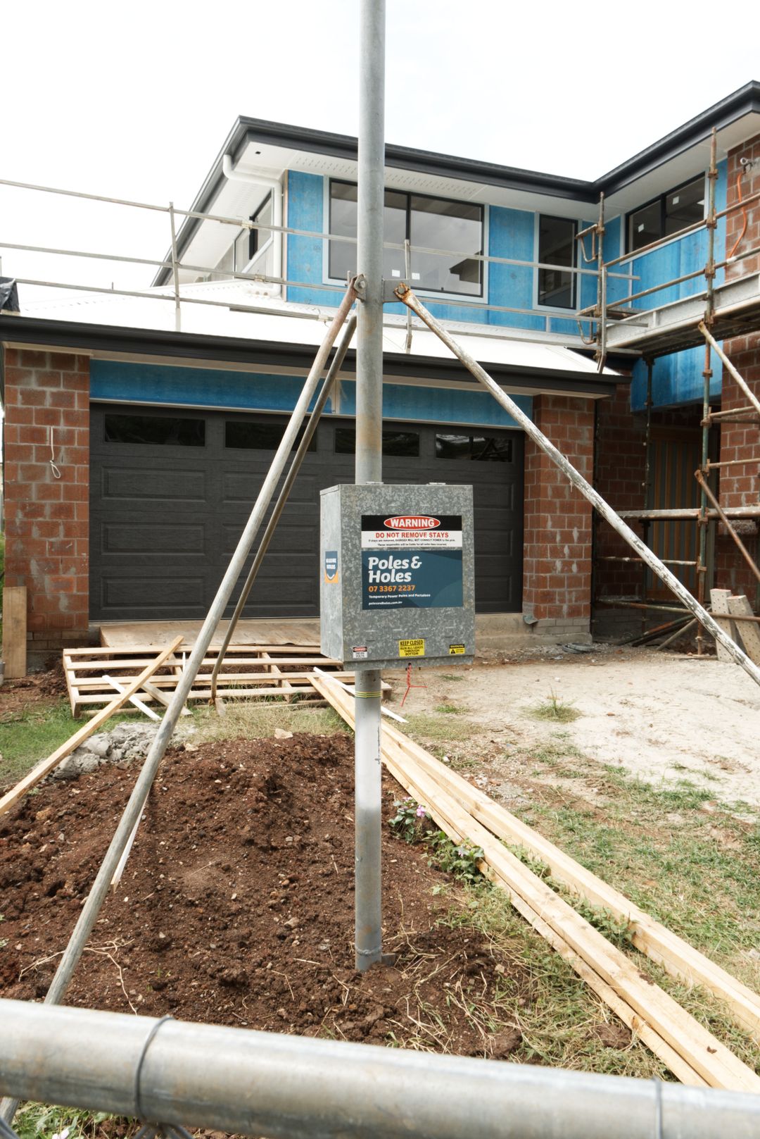 Portaloo hire in brisbane north temporary power builders pole